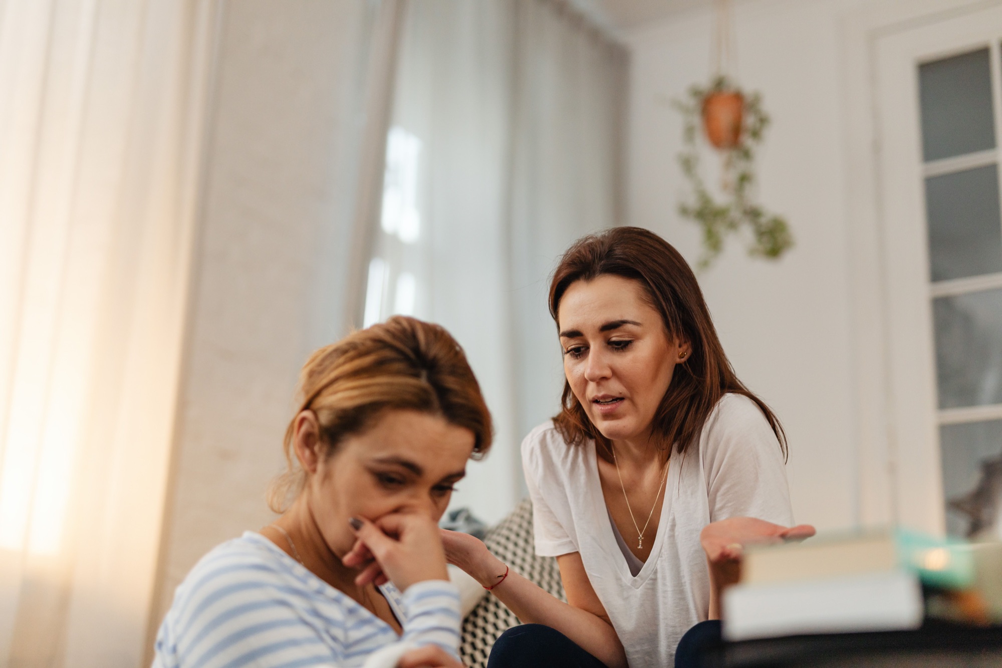 Two women sharing a supportive conversation