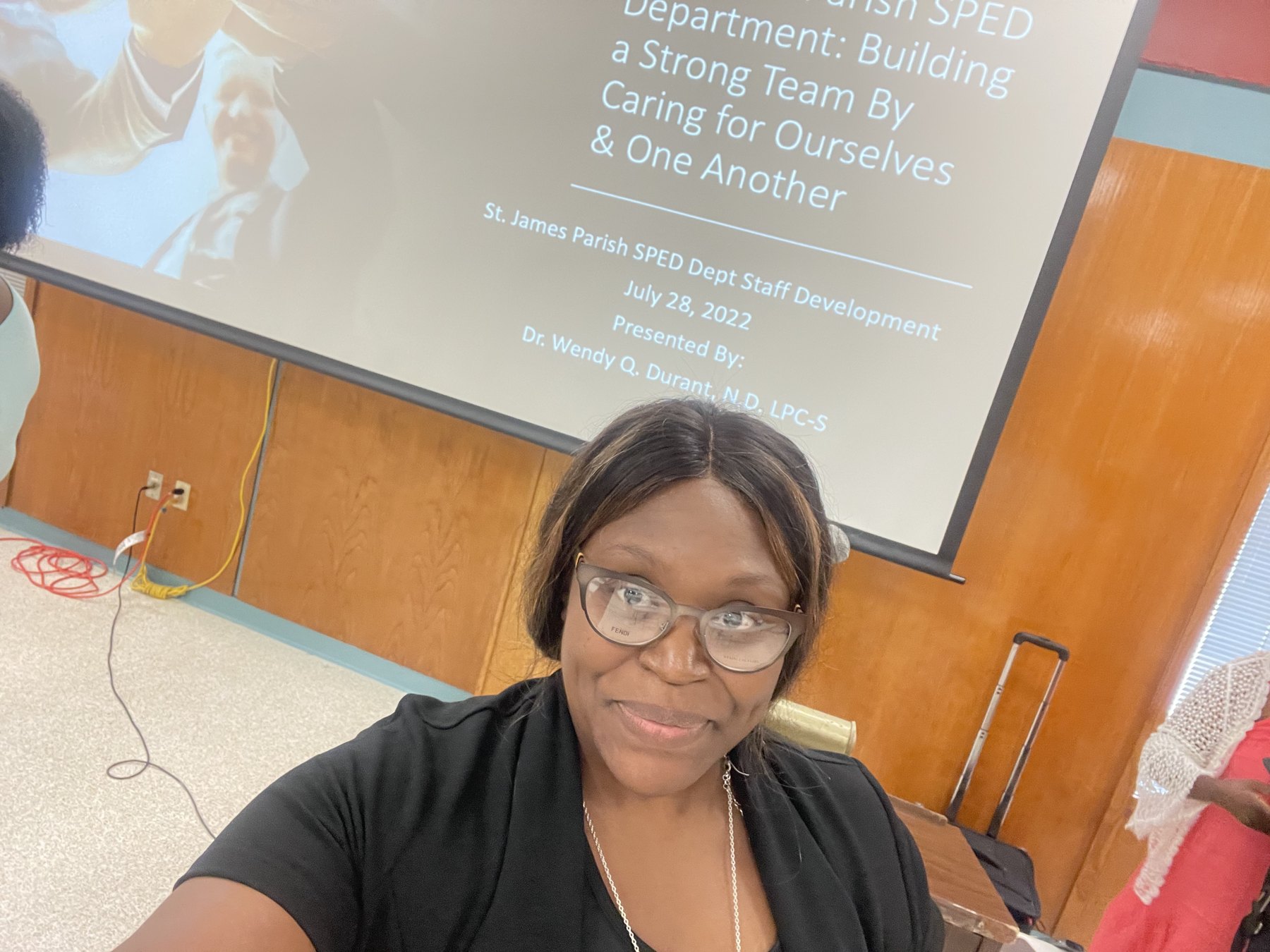 Wendy Q. Durant consulting and training a group of educators